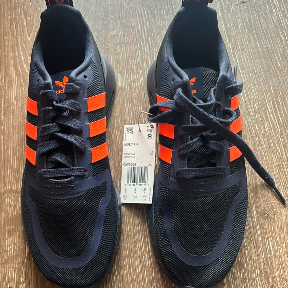BRAND NEW BLUE AND ORANGE ADIDAS SIZE 5.5 PERFECT CONDITION